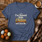 Chickens Don't Scare Me  T-Shirt in Heather Indigo on Shady Hen Mercantile Evergreen mockup