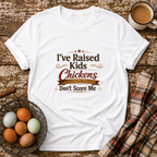 Chickens Don't Scare Me  T-Shirt in White on Shady Hen Mercantile Evergreen mockup